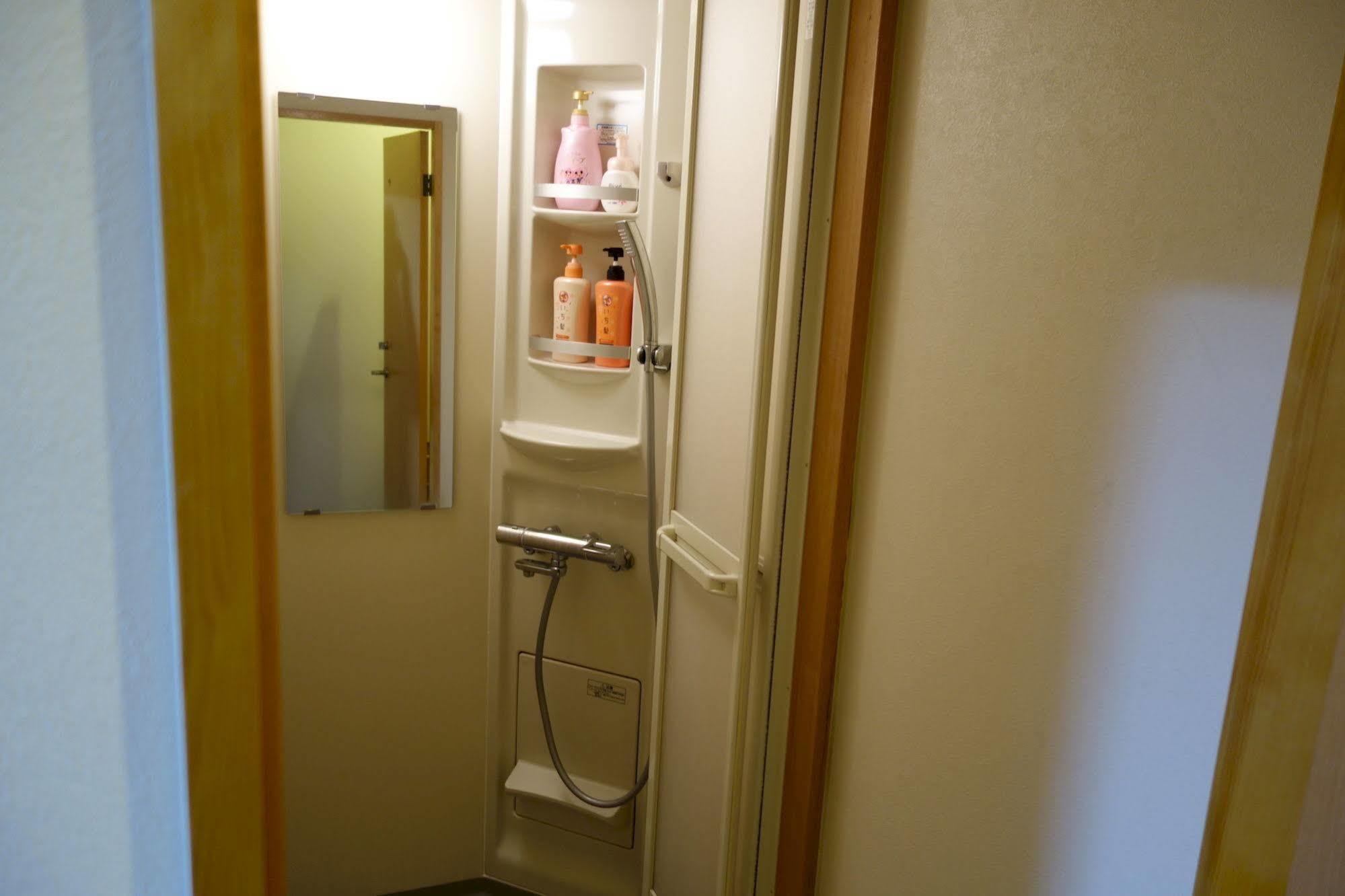 Guesthouse Akicafe Inn Hiroshima Exterior photo