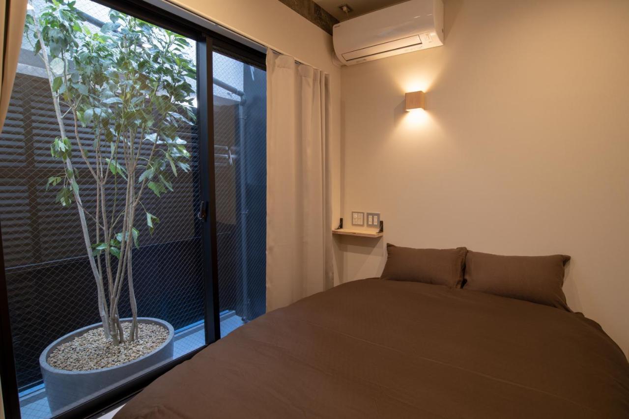 Guesthouse Akicafe Inn Hiroshima Exterior photo