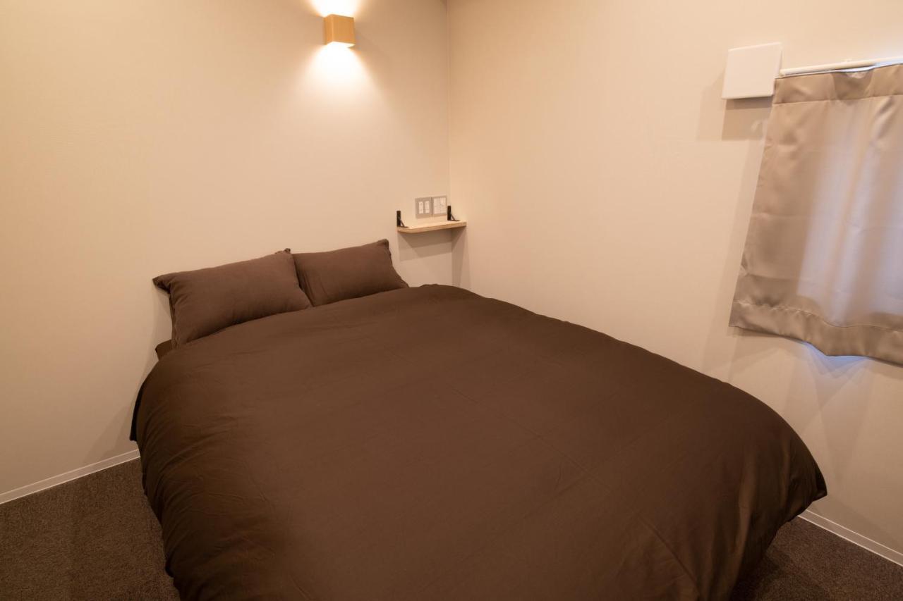 Guesthouse Akicafe Inn Hiroshima Exterior photo