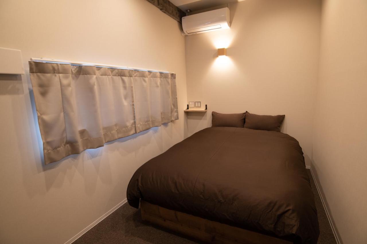 Guesthouse Akicafe Inn Hiroshima Exterior photo