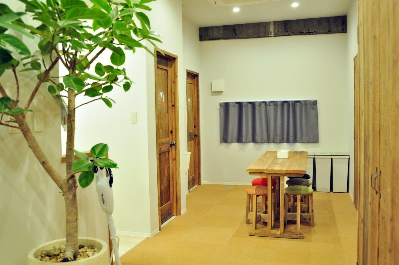 Guesthouse Akicafe Inn Hiroshima Exterior photo