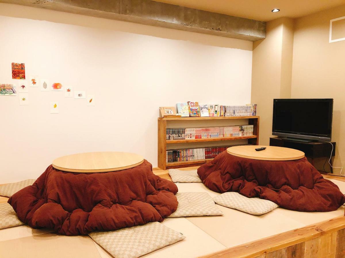 Guesthouse Akicafe Inn Hiroshima Exterior photo