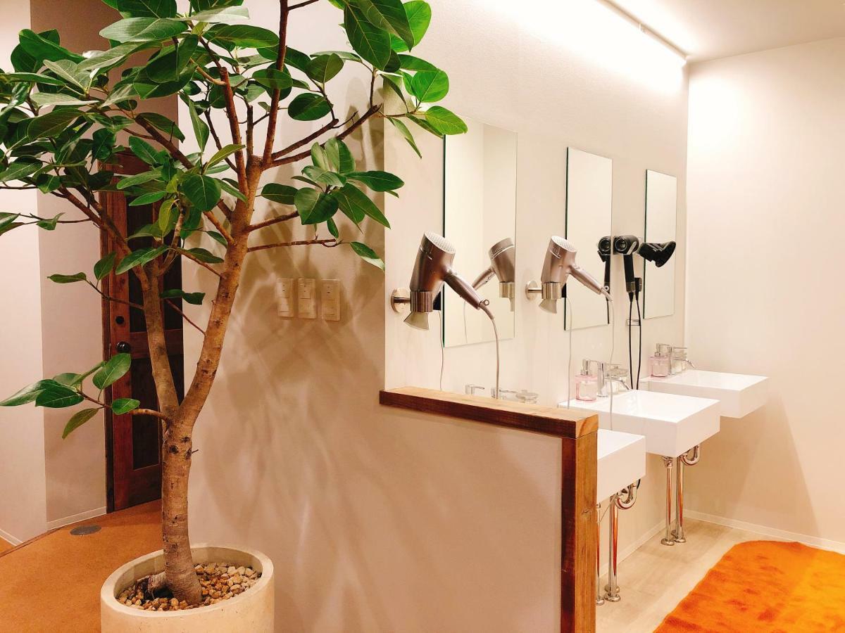 Guesthouse Akicafe Inn Hiroshima Exterior photo
